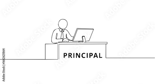 Principal working on computer in the office.