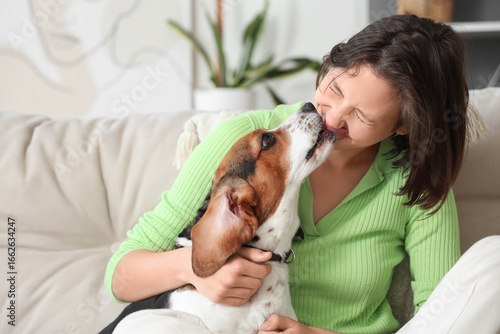 Happy young woman receiving...