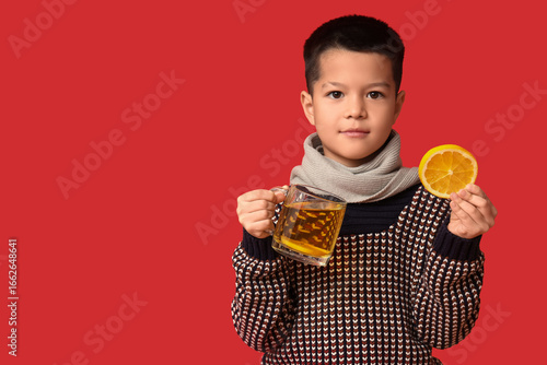 Ill little Asian boy with c...