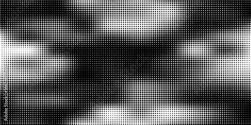 Grunge halftone gradient background. Faded dotted grit noise texture. Black and white rasterized sand wallpaper. Retro pixelated bitmap backdrop.
