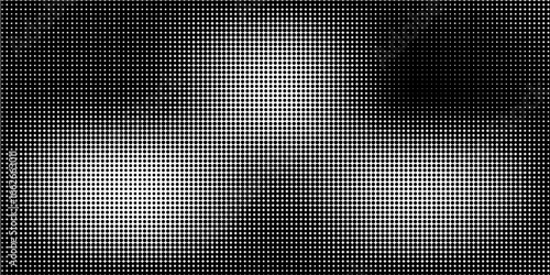Grunge halftone gradient background. Faded dotted grit noise texture. Black and white rasterized sand wallpaper. Retro pixelated bitmap backdrop.