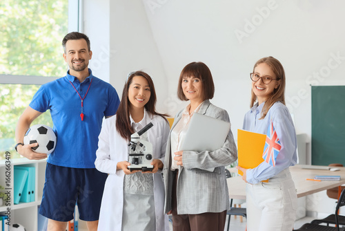 Group of teachers smiling i...