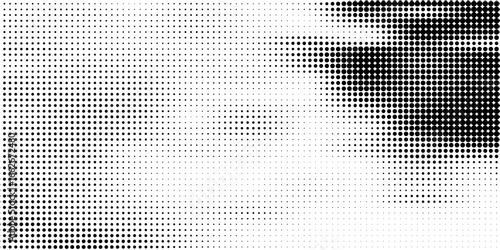 Halftone faded gradient texture. Grunge halftone grid background. White and black sand noise wallpaper. Retro pixelated vector backdrop