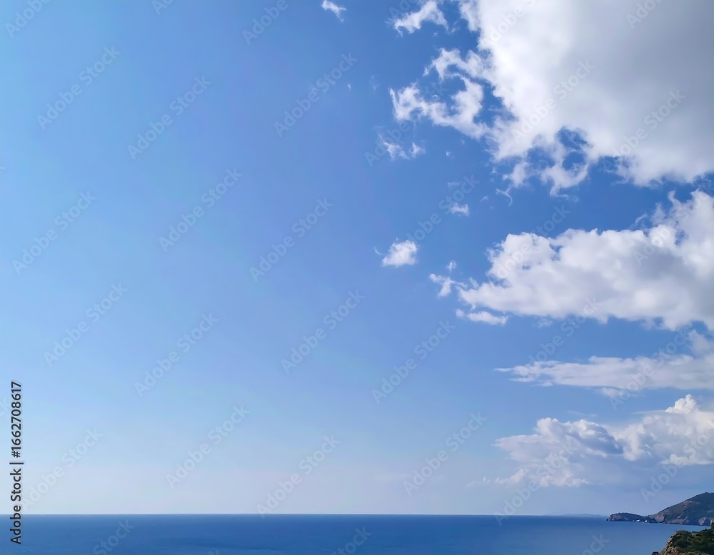 Fototapeta premium Vast blue sky over tranquil sea