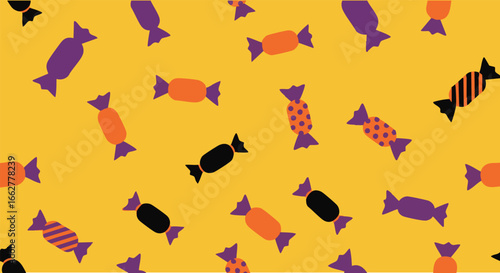 Scattered Halloween candies in orange, purple, and black on a yellow background.