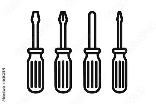 Different types of screwdrivers displayed in a line for various fastening tasks in a workshop setting