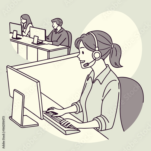 Customer Service Representative Working at a Computer in an Office