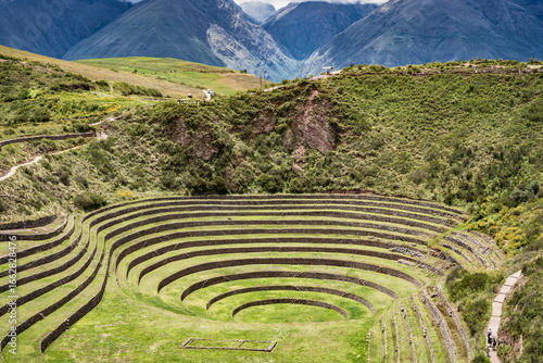 Scenic view with the circular agricultural terraces of Moray an Inca archaeological site in the Sacred Valley of Peru.