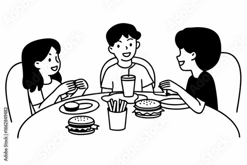 Cheerful friends enjoy burgers and fries together at a casual restaurant table