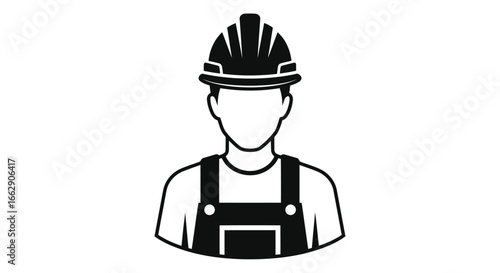Construction worker wearing hard hat and overalls