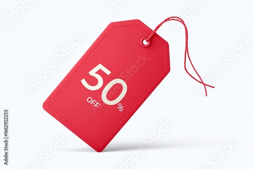 Bold red 50 percent off sale tag with string, perfect for announcing discounts and promotions