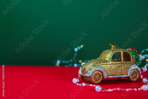 Christmas tree decoration in the form of a golden car