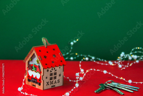 Christmas house in garland, keys nearby