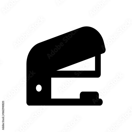 Silhouette of a black stapler with a white circle on the side and a flat base on a white background