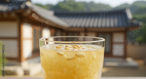 Frosty Glass of Korean Sikhye with Pine Nuts