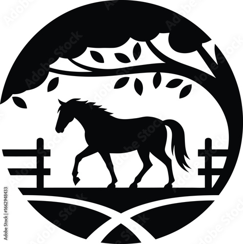 Black silhouette of a horse walking in a pasture under a tree