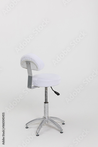 A stylish White Adjustable Office Chair featuring a sleek Chrome Base for modern workspaces
