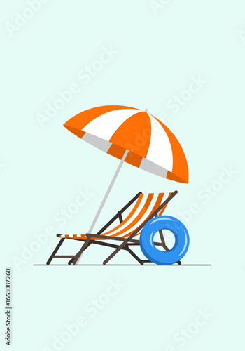 Relaxing beach chair under a striped umbrella with a blue inner tube ready for summer fun by the ocean water
