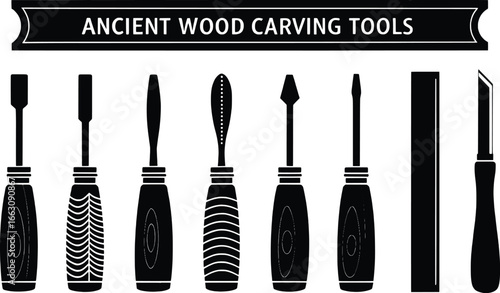Collection of vintage wood carving tools with decorative handles