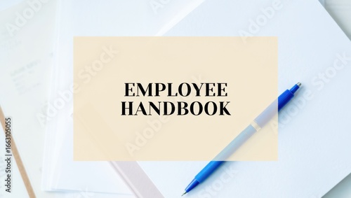 A Close-Up of an Employee Handbook Surrounded by Office Supplies, Highlighting Important Workplace Policies and Procedures in a Professional Setting