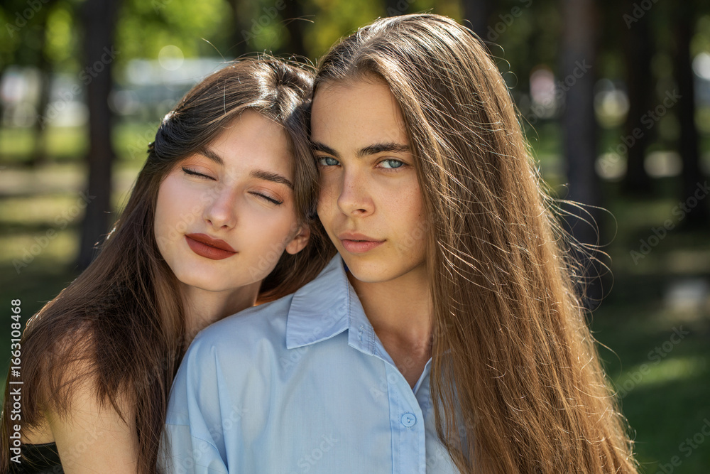 Fototapeta premium Fashion portrait of two girlfriends