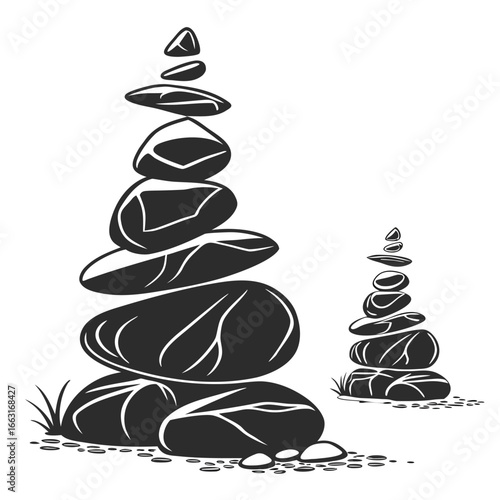 Stacked stones with grass balancing rocks meditation