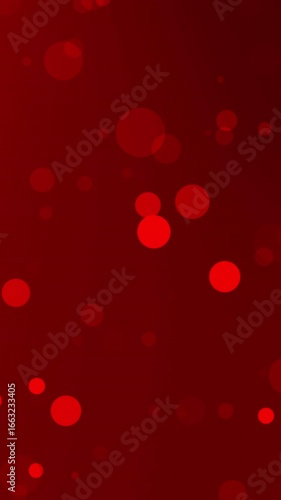gradients red background animation featuring floating bokeh light particles. Ideal for romantic themes, holiday celebrations