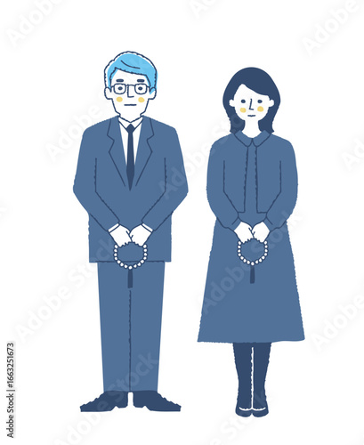 葬儀の参列者・数珠を持っている喪服姿の男女