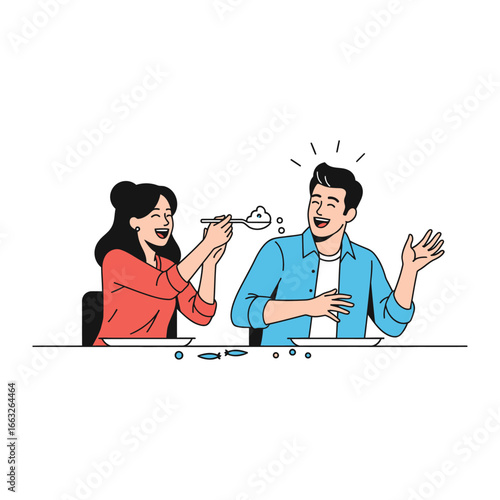 Playful Pair's Plate of Laughs: A cheerful moment captured as a man is fed from a spoon, sparking a fit of laughter during meal time. 