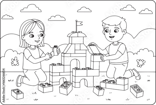 Cheerful kids playing together constructing a castle with toy bl