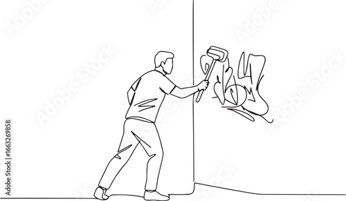 Illustration depicting graffiti removal by a man using cleaning