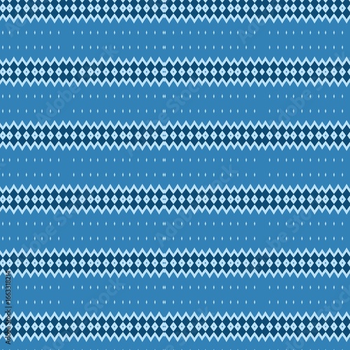 Minimalist geometric seamless pattern with horizontal rows of zigzag lines and diamond motifs in a cool blue color palette