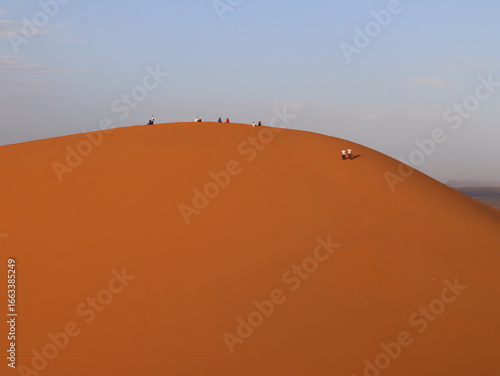 Golden Sand Dunes of the Sahara Desert in Merzouga, Morocco