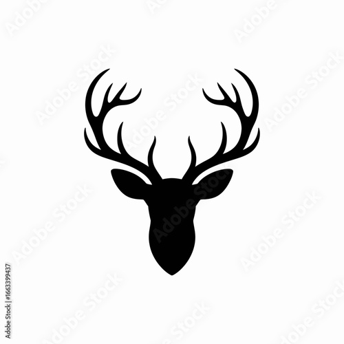 Majestic deer head silhouette with antlers isolated on white background