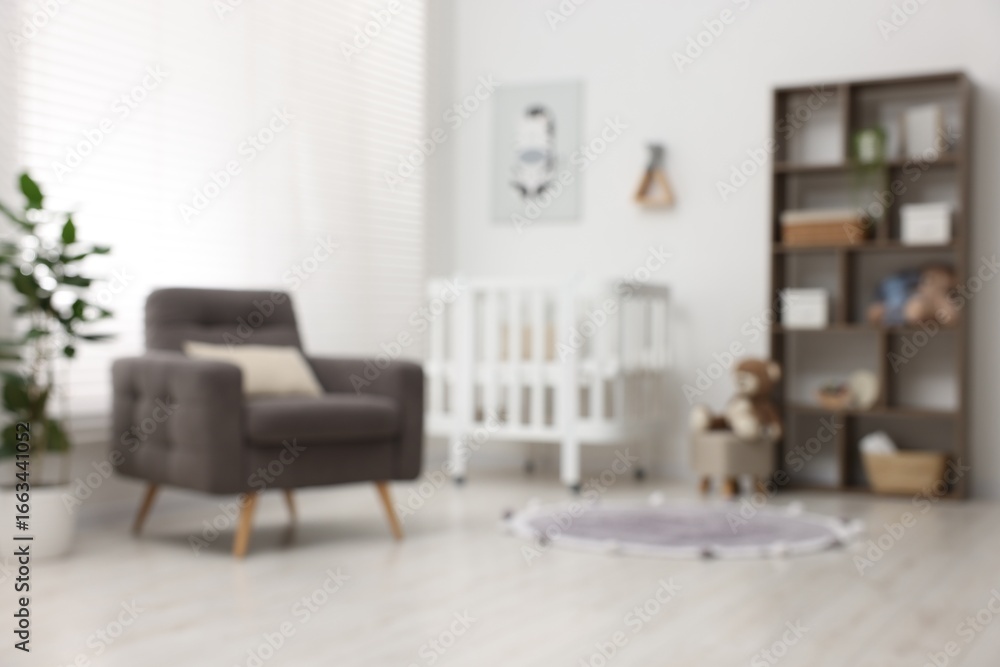 Fototapeta premium Blurred view of baby's room. Interior design