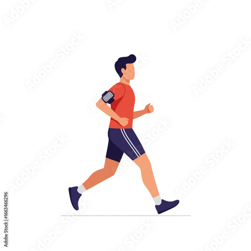 A fit young man wearing athletic gear and an armband runs with purpose, embodying an active lifestyle and healthy exercise routine.
