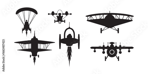 Silhouettes of various flying vehicles including planes and a parachute on a white background