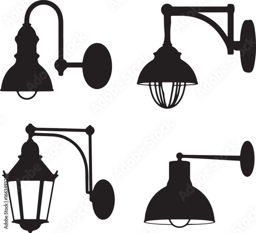 Black silhouettes of four wall mounted lamps lighting