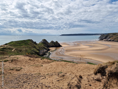 Photos Three Cliffs Bay on the Gower Peninsular West Glamorgan Wales which is a popular