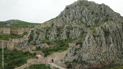 Explore the ancient acrocorinth fortress ruins perched high on a rocky mountain peak