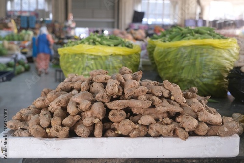 Close up of pile of fresh ginger roots on stall in bazaar in Dushanbe, Tajikistan