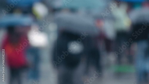 Wallpaper Mural Abstract blurred of people walking with colorful umbrellas in the rain. Perfect for concepts of mood, weather, city life, and artistic visuals. Background Torontodigital.ca