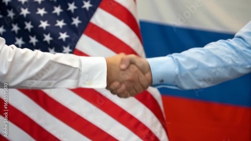 International Relations & Cooperation: US and Russian Representatives Shaking Hands with Flags in the Background | Diplomacy & Agreements