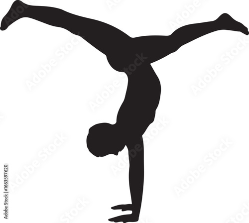 Silhouette of a gymnast performing a handstand with legs spread wide