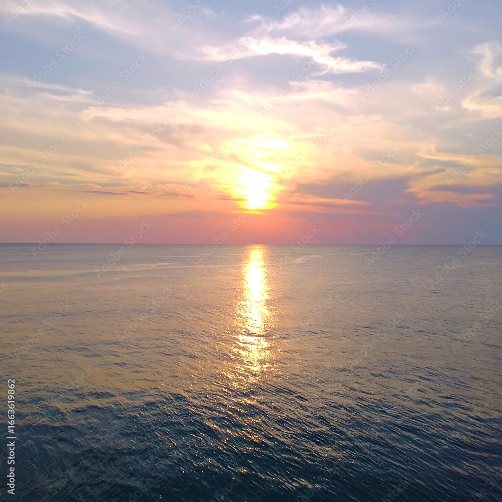 Fototapeta premium Serene sunset over calm ocean