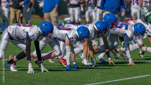 Quadro em tela Defensive Line High School Football Boys of Fall Sports