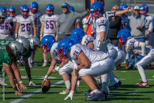 Fotografie QB and O-Line Set - High School Football Boys of Fall Sports