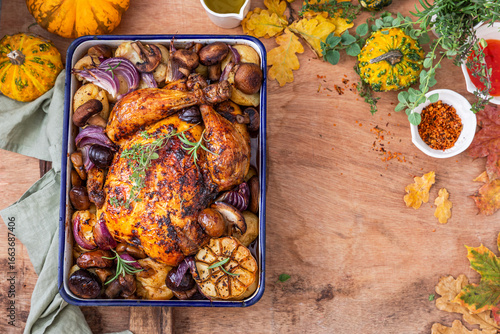 Roasted chicken with vegetables, herbs and chestnuts
