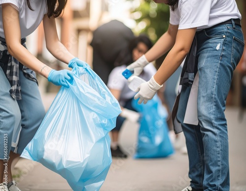 Volunteers Cleaning Up Trash on the Street for Community Service