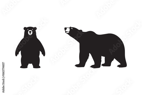 Two black bears one standing and one reaching up